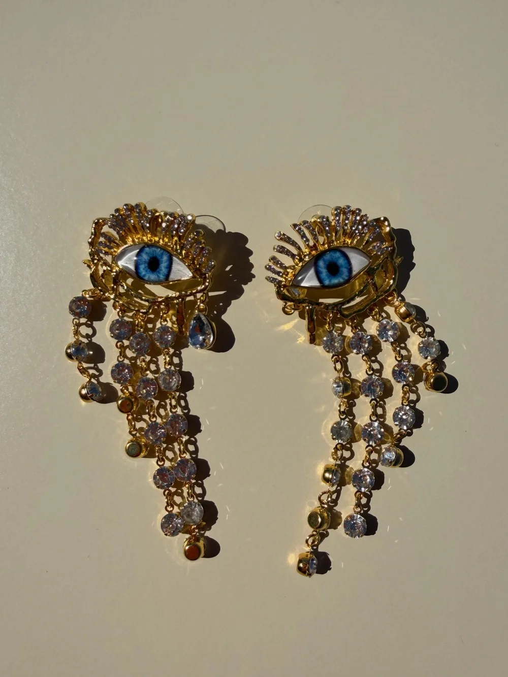 ✨ Celestial Eye Statement Earrings – Crystal Dangle Charms & Gold-Tone Artistry